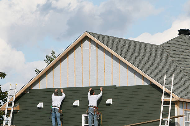 Professional Siding Installation technician working in Waltham, MA